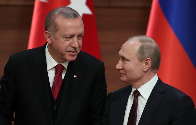 Presidents Tayyip Erdogan of Turkey and Vladimir Putin of Russia hold a joint news conference after their meeting in Ankara, Turkey April 4, 2018. REUTERS/Umit Bektas