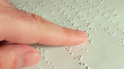 stock-footage-male-hand-reading-braille-male-hand-reading-braille-dot-language-for-the-blind