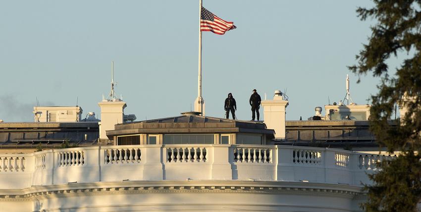 US national flag flies at half staff at the White House