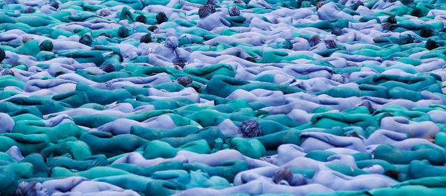 Nude models pose for a photograph by U.S. artist Spencer Tunick, for a project titled "Sea of Hull" in Hull city centre, northern England, July 9, 2016.   REUTERS/Andrew Yates